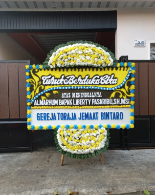 Papan Bunga Duka di Tumpak